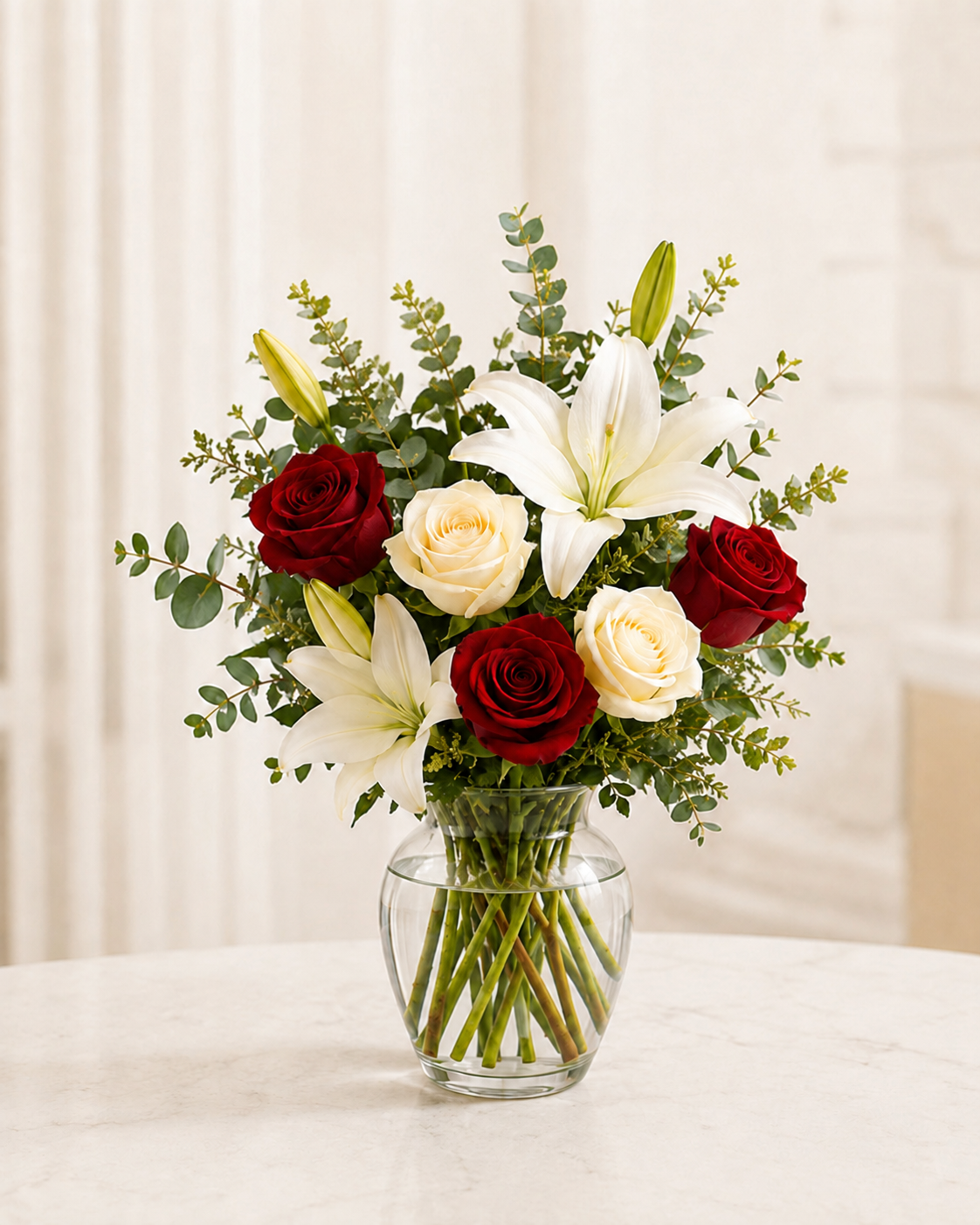 Rose and lily bouquet handcrafted by Floral Masters