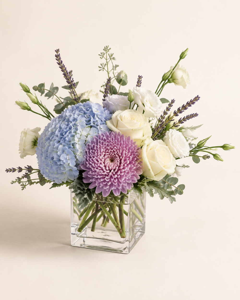 Calm in Clear Glass floral arrangement by Floral Masters