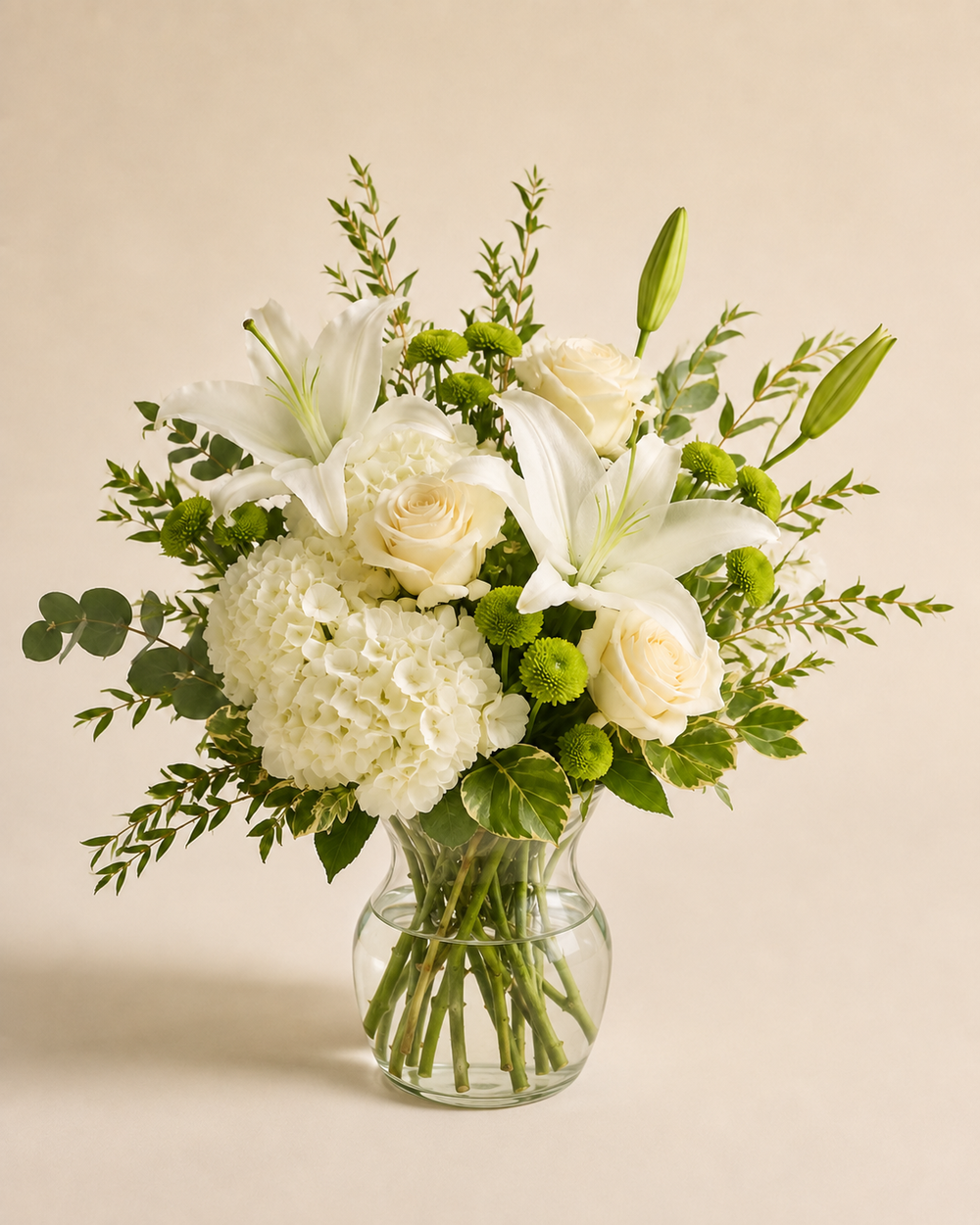 Magnolia Glasshouse Standard white floral arrangement in clear glass gathering vase