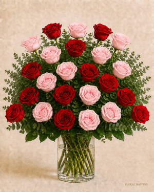 24 red and light pink roses, 12 of each, in a clear glass vase