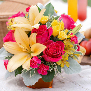 Spread Sunshine Bouquet — original catalog lifestyle photo, Standard arrangement shown in a room setting