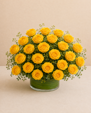 Exactly 24 yellow roses in a low leaf-wrapped clear glass vase