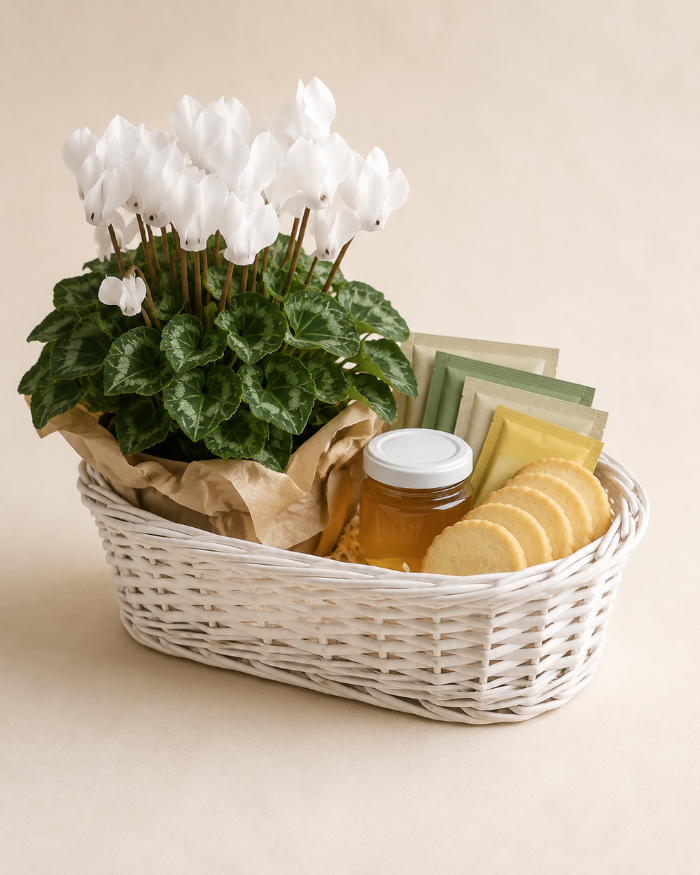 White Cyclamen Tea Basket with tea honey and lemon shortbread